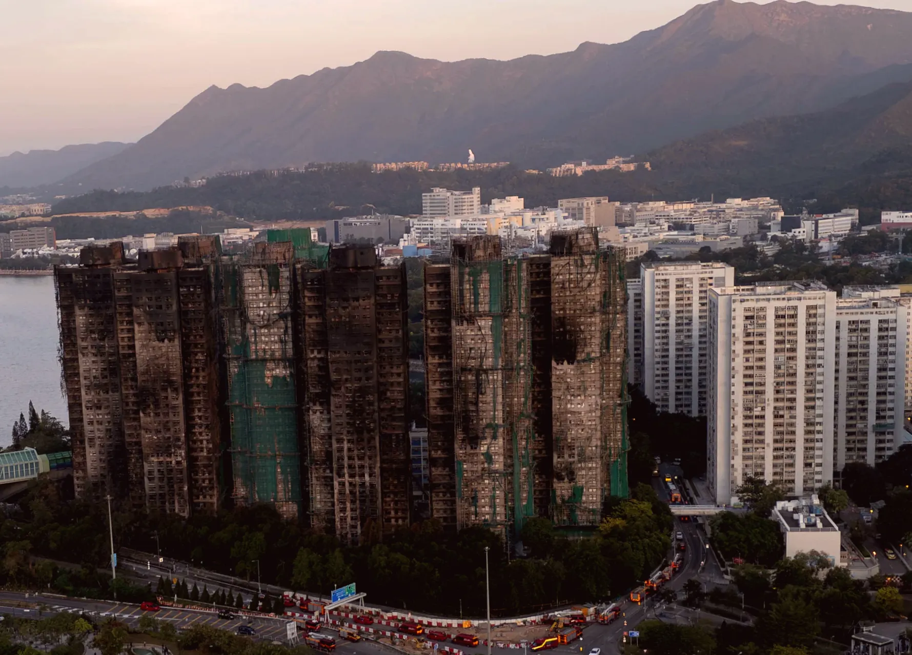 Hong Kong police detain man for online comments about fatal fire