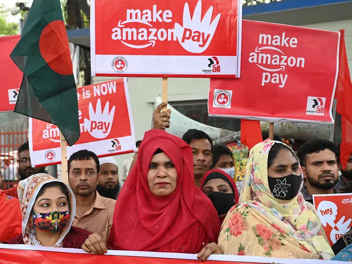 Amazon workers worldwide protest against warehouse conditions, AI growth, and ICE connections on Black Friday