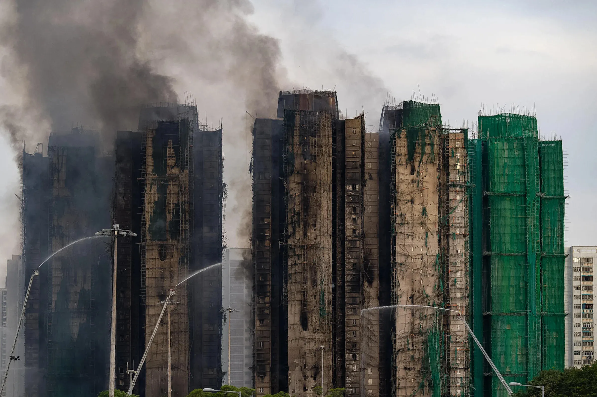 94 dead in Hong Kong high-rise fire, with 3 arrests made