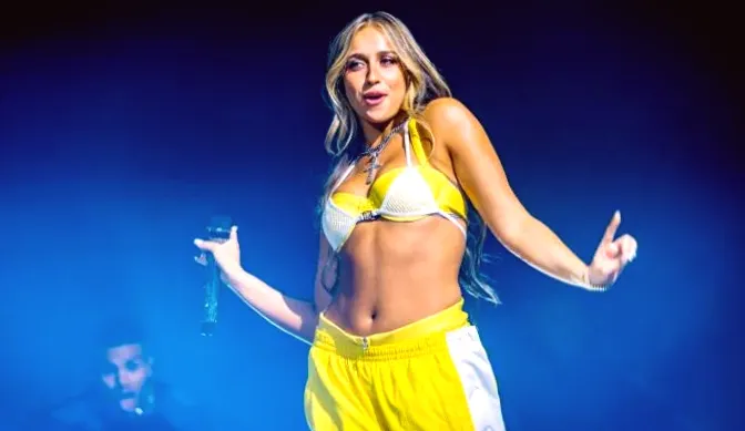 Tate McRae seen getting close with NHL player Jack Hughes