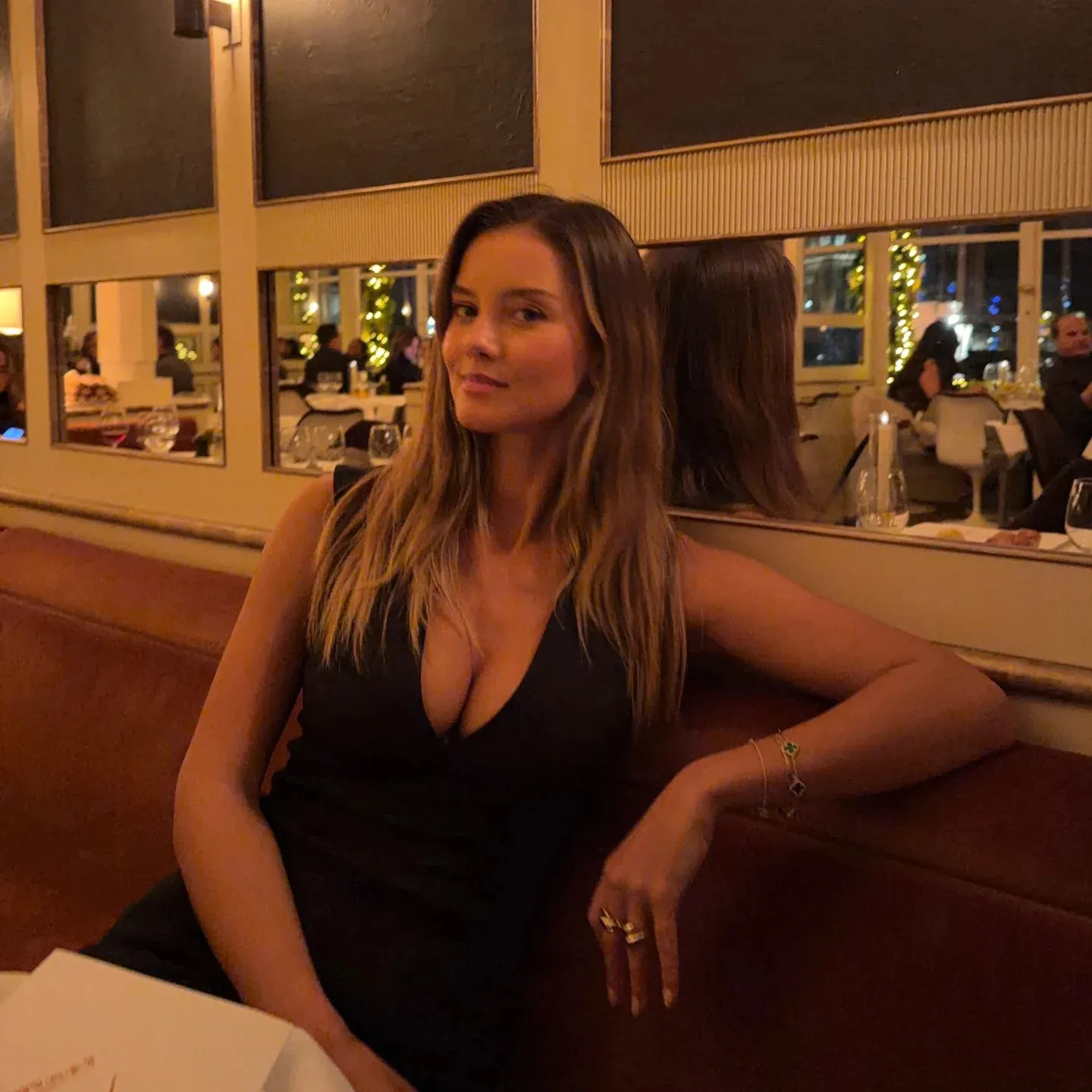 Victoria’s Secret Model Nicola Cavanis Stuns in Revealing Black Dress for Evening Glamour