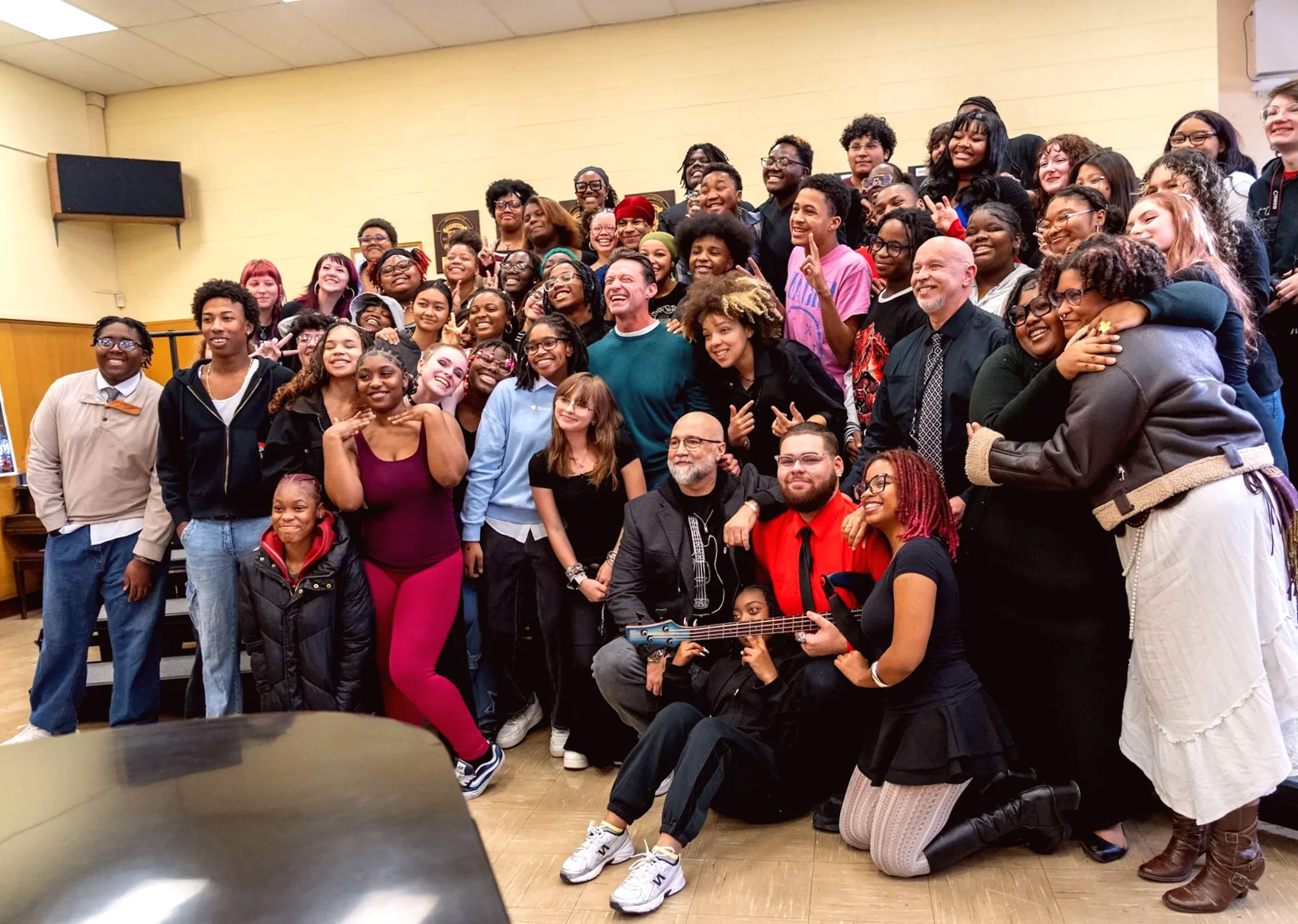Hugh Jackman surprises high school choir with unexpected visit