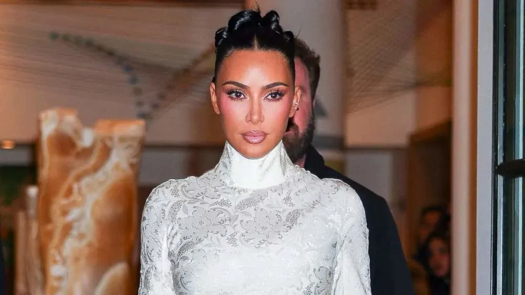 Kim Kardashian's Bold Christmas Spirit Shines in Minidress
