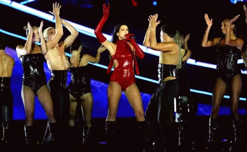 Dua Lipa's Fiery Red Bodysuit Held Together by Just Two Belts