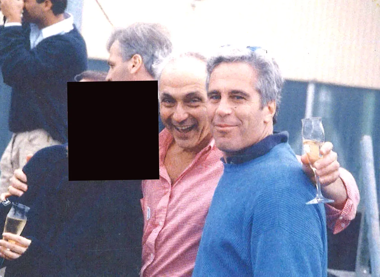 OSU alumni demand testimony while holding photos of billionaire Les Wexner with Jeffrey Epstein
