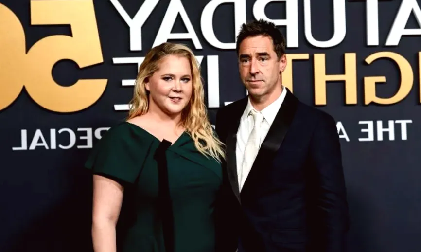 Amy Schumer and her husband's marriage is irreparably damaged, says source.