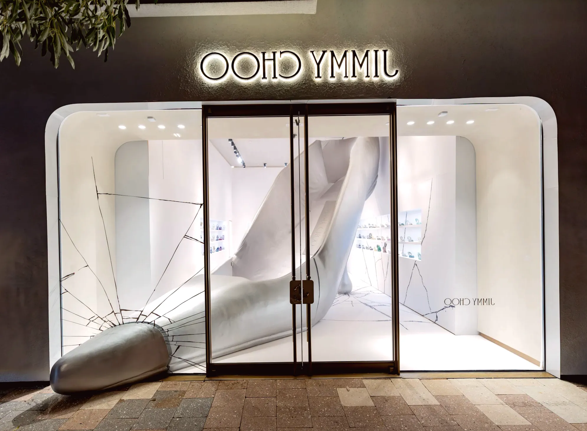 Jimmy Choo Makes a Statement at Miami Art Week with Oversized Silver Chrome Shoe