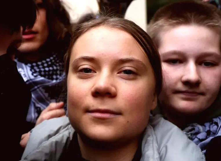 Greta Thunberg detained in London for displaying protest sign