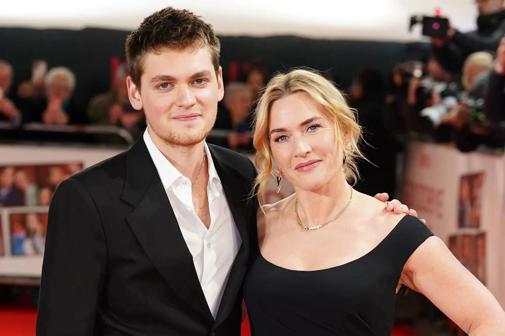 Kate Winslet and her 21-year-old son Joe happily attend the London premiere of their new film "Goodbye June"