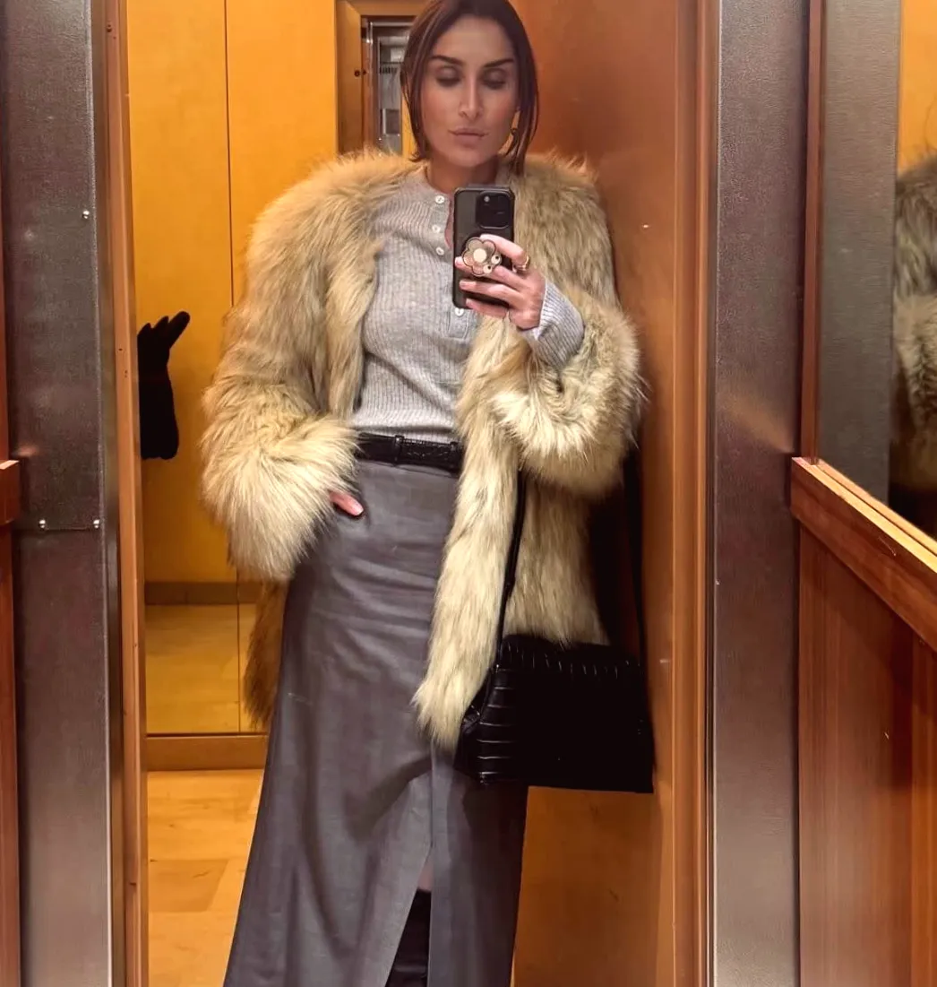 Skirt and Boots: The Preferred Combination in Paris and L.A., Not Jeans