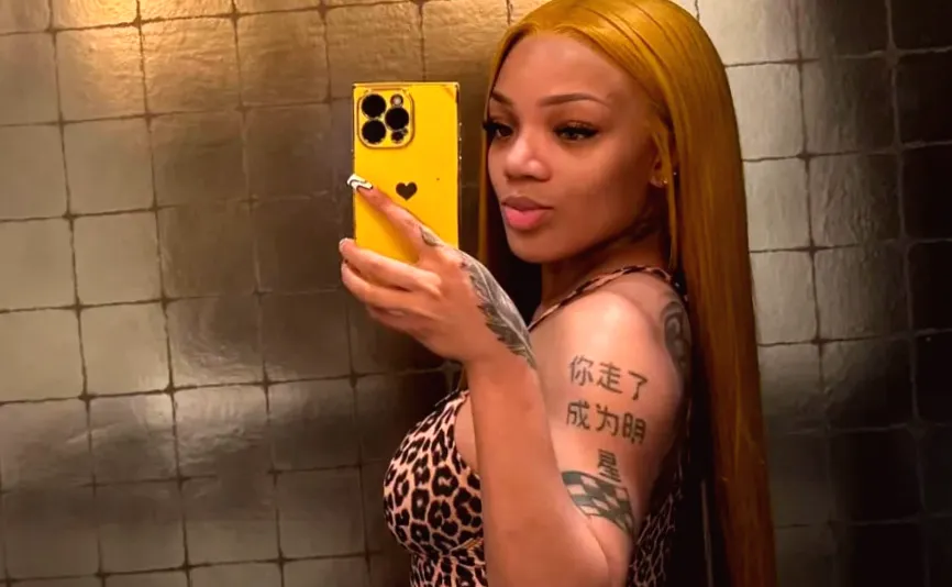 GloRilla's Tiny Top Highlights Her Sheer Skirt in Photos