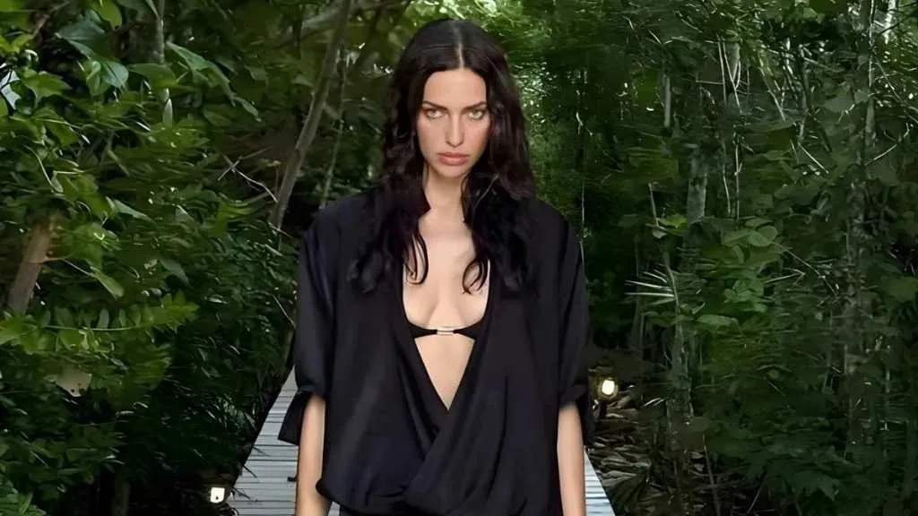 Irina Shayk Swaps Bikinis for Riskier Outfit in Pool Photo