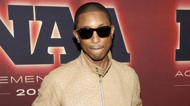Pharrell Williams reflects on his upbringing and the challenges faced by Black and brown people as he accepts FNAA award