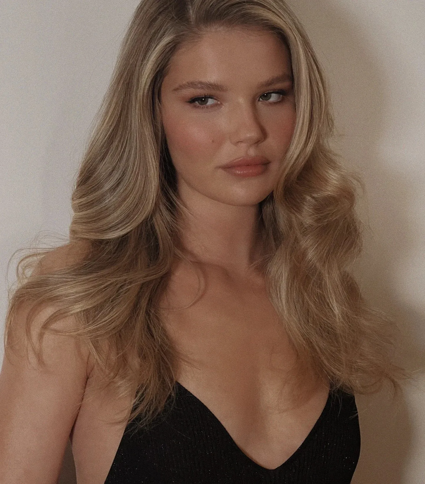 Sports Illustrated Swimsuit Model Ellie Thumann Shines in Deep V-Neck Beaded Dress