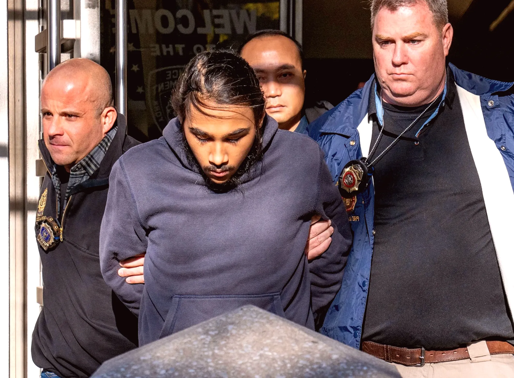 Adolescent charged with federal offenses for reportedly setting fire to homeless man on subway