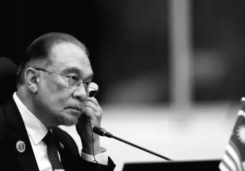 Lawsuit filed against Malaysia PM and police chief for accusing plot involvement.