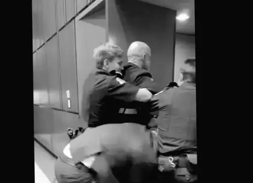 Marine Veteran Charged with Criminal Offenses for Breaking Arm Protesting Iran War