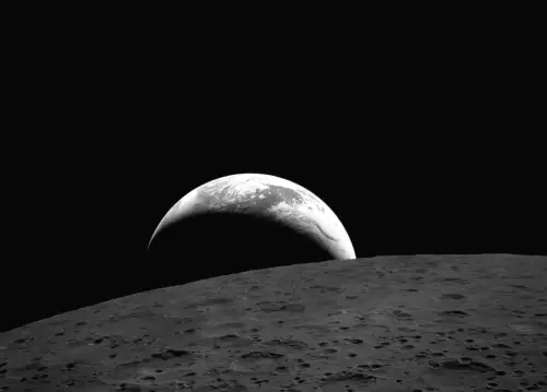 Nasa releases first images from Moon fly-by: Earthset and a solar eclipse captured