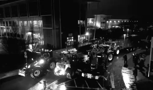 Farmers protest outside supermarket depot, blocking road