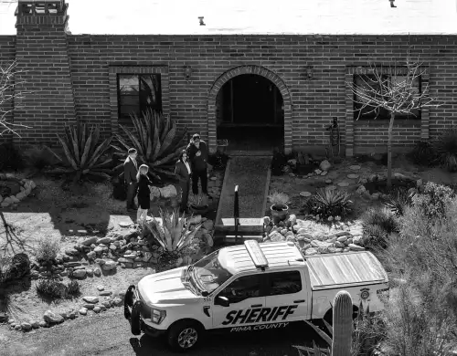 Volunteers Use Metal Detectors on Nancy Guthrie's Property Following Sheriff's Update on Masked Suspect.