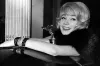 View Historical Pictures of Shirley MacLaine During Her Career - from "Hot Spell" Era to Lifetime Achievement Award Recipient