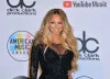 Mariah Carey Prepared Thanksgiving Greens Wearing Latex Gloves — And a $40,000 Diamond Ring on Top