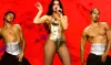 Dua Lipa's Mesmerizing Gold Bodysuit Outfit