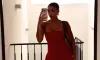 Photo shows Lori Harvey wearing a lace-heavy tiny sheer minidress