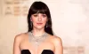 Dakota Johnson's Eye-Catching Black Bralette Top Outfit