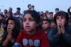 Impromptu film showings in Gaza City provide children with a break from devastation