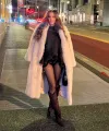 Leah Van Dale Stuns in Fur Coat Showing Off Long Legs